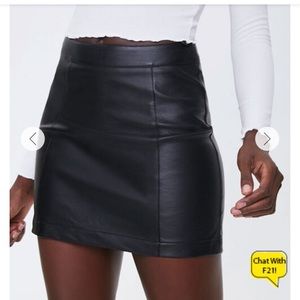 Black leather mini skirt